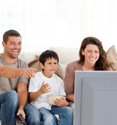 Family Watching TV - Reality Show